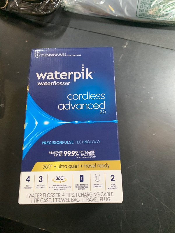 Photo 1 of Waterpik Cordless Advanced 2.0 Water Flosser For Teeth, Gums, Braces, Dental Care With Travel Bag and 4 Tips, ADA Accepted, Rechargeable, Portable, and Waterproof, Black WP-582, Packaging May Vary