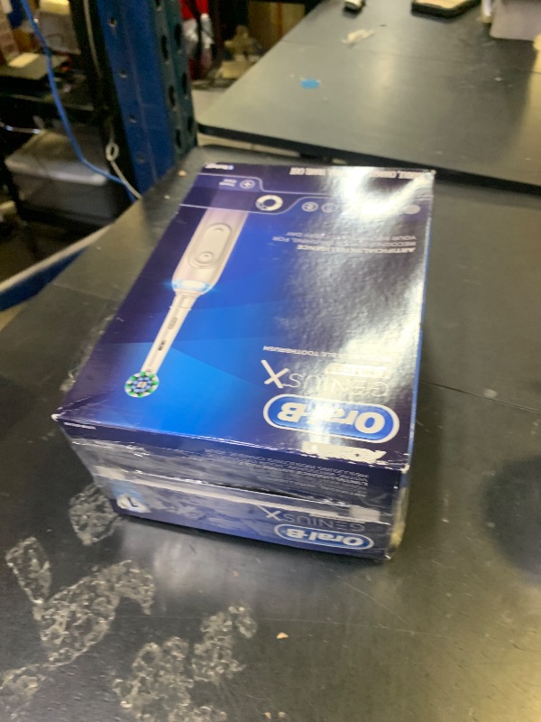Photo 1 of Oral-B Genius X Limited Rechargeable Electric Toothbrush with 1 Replacement Brush Head, Travel Case, White