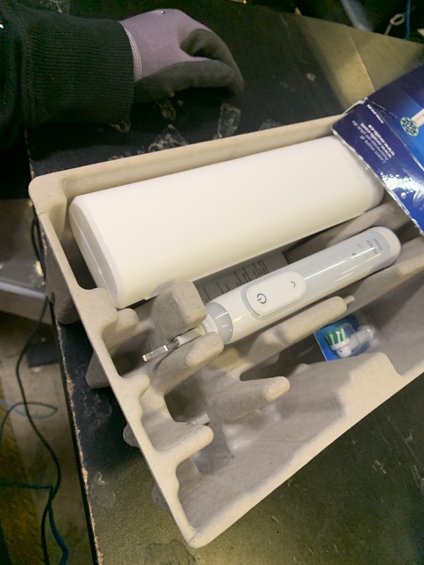 Photo 1 of Oral-B Genius X Limited Rechargeable Electric Toothbrush with 1 Replacement Brush Head, Travel Case, White