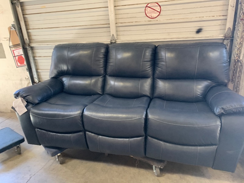 Photo 1 of dark blue couch