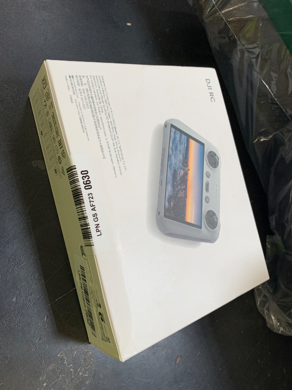 Photo 1 of DJI RC, Remote Controller with Lightweight Body, FHD Screen, 4hr Battery, Precision Control Sticks, O3+ Transmission
