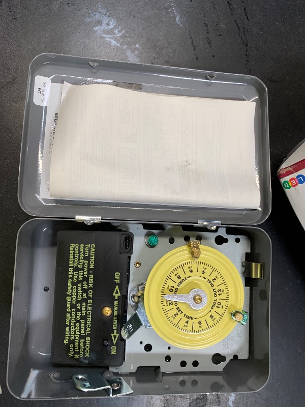 Photo 1 of Intermatic T101 24-Hour Mechanical Time Switch - Reliable Control for Various Loads, 12 ON/Off Operations - Manual Override & Included Trippers, Designed for Industrial, Commercial, Residential