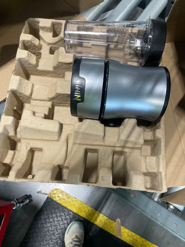 Photo 1 of ****INCOMPLETE***Ninja Nutri-Plus Personal Blender | Compact Push to Blend | Make Frozen Drinks, Smoothies, Sauces & More | With (3) 20 oz. To-Go Cups, (2) Spout-Lids & (1) Storage-Lid | 900 Peak Watt | Silver | BN301