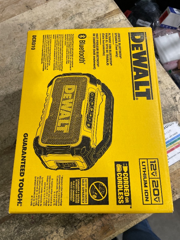 Photo 1 of ***UNABLE TO TEST***DEWALT 20V MAX Bluetooth Speaker, 100 ft Range, Durable for Jobsites, Phone Holder Included, Lasts 8-10 Hours with Single Charge (DCR010), Black Yellow