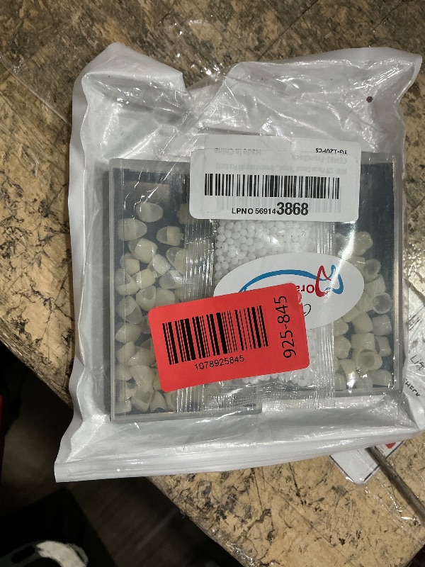 Photo 1 of Fake Tooth Cap Crown Veneers Front Back Anterior and Molar Posterior Teeth with Thermal Beads Cap Filler for Teaching or DIY ( Front and Back)
