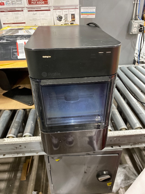 Photo 1 of **. missing scooper, and tank valve*** parts only**
GE Profile standard 2.0 Ultra Nugget Ice Maker with .75 Gallon Side Tank and Scale Inhibiting Filter, Scoop Included, 38 lbs in 24 Hours, Pellet Ice Machine with WiFi & Smart Connected, Black