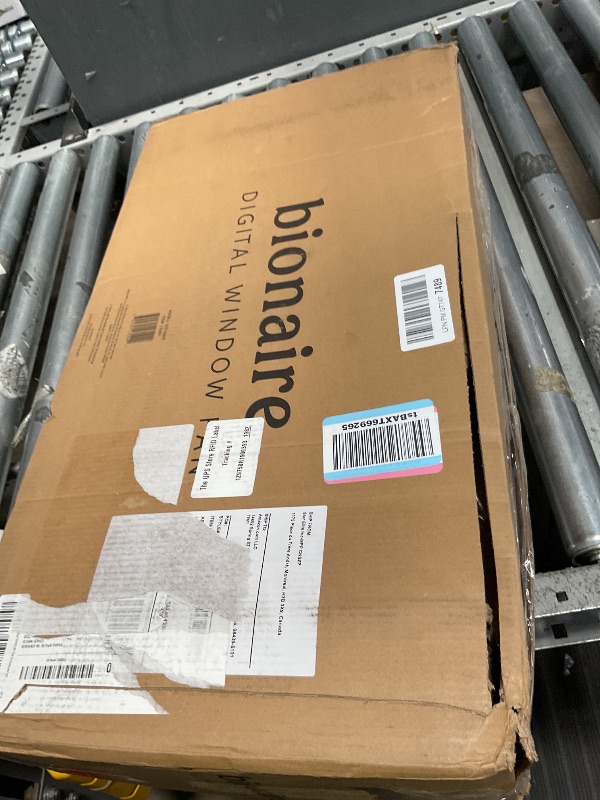 Photo 1 of **VERY DIRTY, NEEDS CLEANING** Bionaire Window Fan with Reversible Airflow Blades – 3-Speed Settings, Programmable Thermostat, LED Display, Remote Control, Fits 24–36" Windows, No Assembly Required