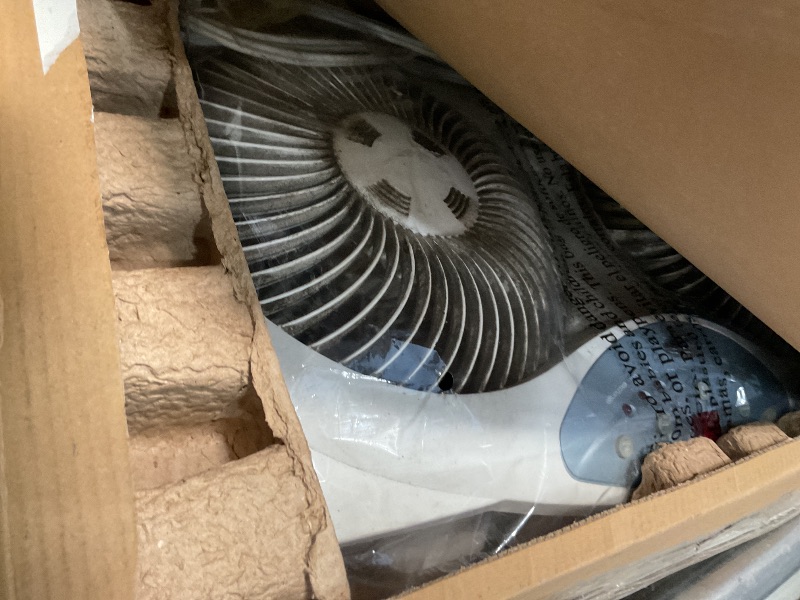 Photo 1 of **VERY DIRTY, NEEDS CLEANING** Bionaire Window Fan with Reversible Airflow Blades – 3-Speed Settings, Programmable Thermostat, LED Display, Remote Control, Fits 24–36" Windows, No Assembly Required