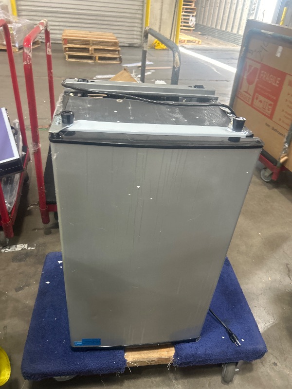 Photo 1 of ***FOR PARTS ****

 NEWBULIG Mini Fridge with Freezer 3.2 Cu.Ft Small Refrigerator for Office, Dorm, Small Fridge with Adjustable Thermostat, Energy Saving, Singel Door, Sliver