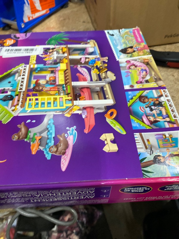 Photo 1 of ***SEE NOTES BEFORE BIDDING***

LEGO Friends Beach House with Seals Building Toy for Girls & Boys - Pretend Play Set for Kids, Ages 7+ - W/3 Minidolls, 2 Toy Animals, & Accessories - Gift Idea for Birthdays - 42699