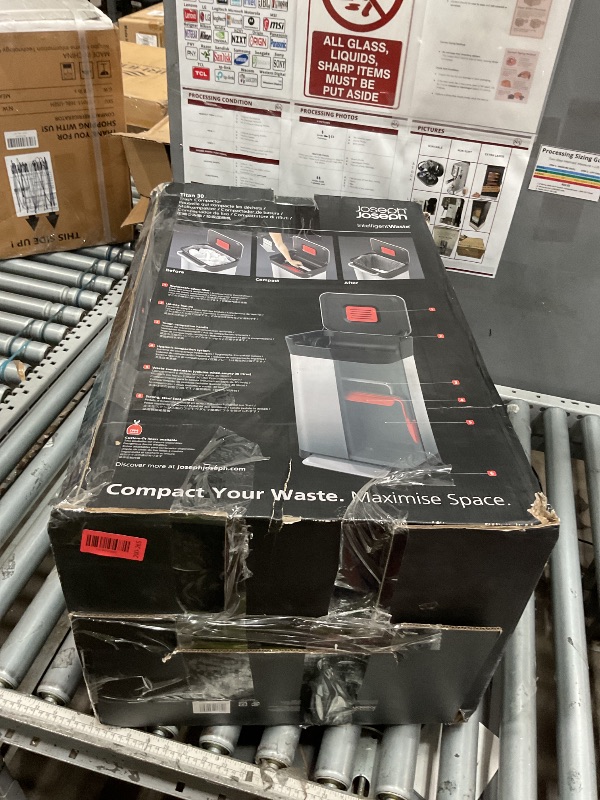 Photo 1 of **VERY DENTED ON SIDE** Joseph Joseph Intelligent Waste Titan Trash Can Compactor with Odor Filter, Compacts up to 3x trash, 30L/7.9 Gallons, Stainless Steel