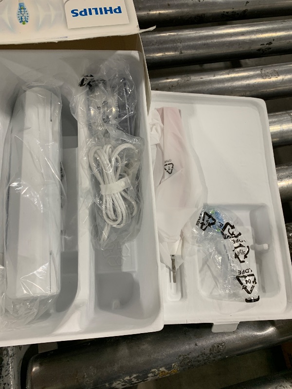 Photo 1 of Philips Sonicare DiamondClean 9000 Electric Toothbrush - Sonic Toothbrush with App, Pressure Sensor, 12 Brushing Settings, Replacement Reminder, Charging Stand, Travel Case, Pink, HX9911/90