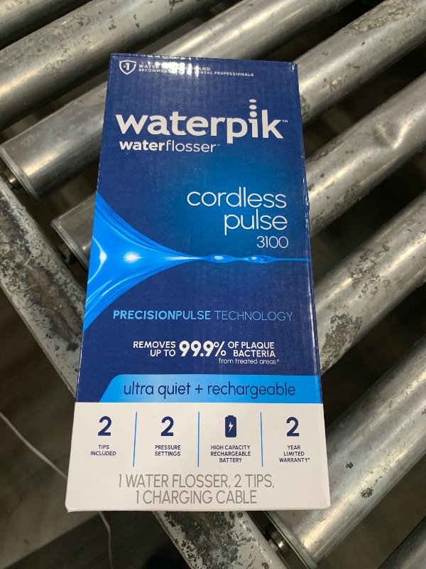 Photo 1 of Waterpik Cordless Pulse 3100 Rechargeable Portable Water Flosser for Teeth, Gums, Braces Care and Travel with 2 Flossing Tips, Waterproof for Shower Use, ADA Accepted, WF-20 Blue, Amazon Exclusive