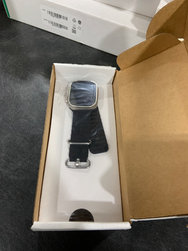 Photo 1 of Apple Watch Ultra [GPS + Cellular 49mm] Titanium Case with Midnight Ocean Band, One Size (Renewed)