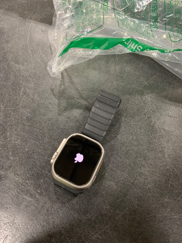 Photo 1 of Apple Watch Ultra [GPS + Cellular 49mm] Titanium Case with Midnight Ocean Band, One Size (Renewed)