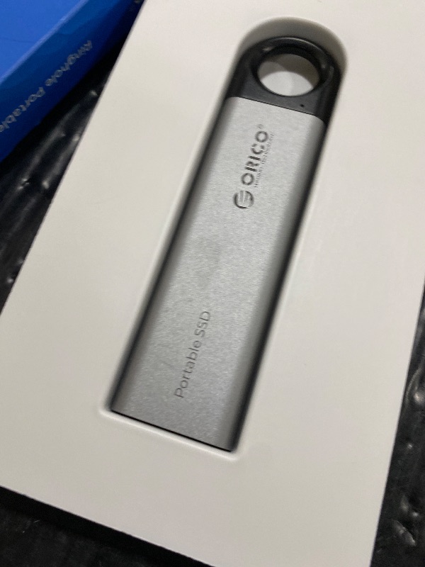 Photo 1 of ORICO 1TB External SSD Up to 1050MB/s, Hanging Hole Design Portable Solid State Drive, USB C&A 2 in 1 Cable, Reliable Storage for Type-C Smartphone, Tablets, Laptops - C10