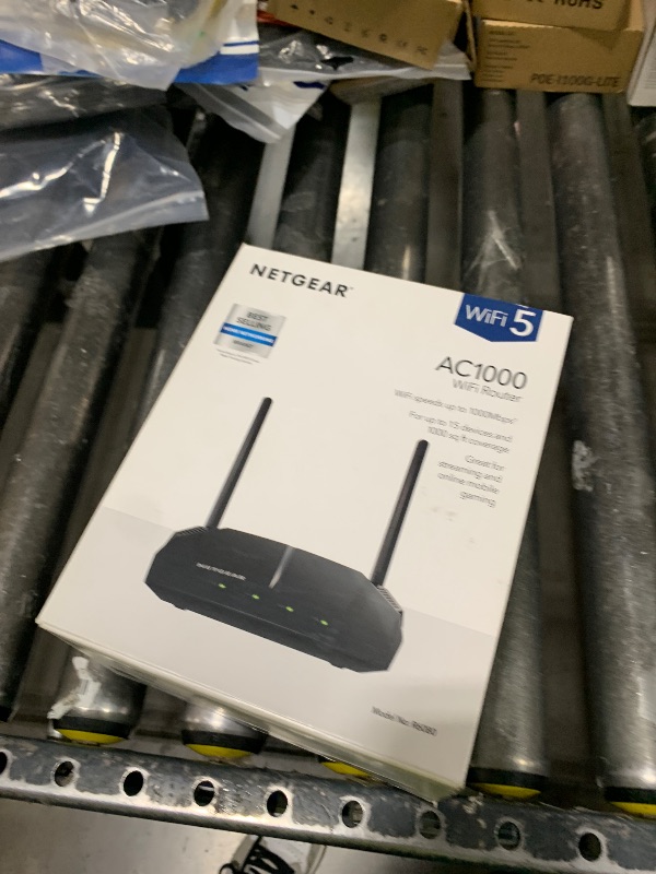 Photo 1 of NETGEAR WiFi Router (R6080) - AC1000 Dual Band Wireless Speed (up to 1000 Mbps) | Up to 1000 sq ft Coverage & 15 Devices | 4 x 10/100 Fast Ethernet Ports