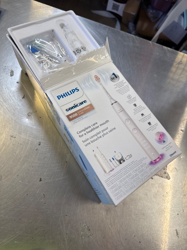 Photo 1 of Philips Sonicare DiamondClean Smart 9500 Electric Toothbrush - Sonic Toothbrush with App, Pressure Sensor, 15 Brushing Settings, Replacement Reminder, USB Charging Travel Case, White, Model HX9923/01