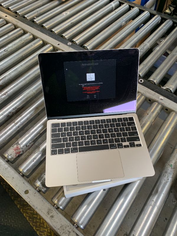 Photo 1 of Apple 2025 MacBook Air 13-inch Laptop with M4 chip: Built for Apple Intelligence, 13.6-inch Liquid Retina Display, 16GB Unified Memory, 256GB SSD Storage, 12MP Center Stage Camera, Touch ID; Starlight. locked
