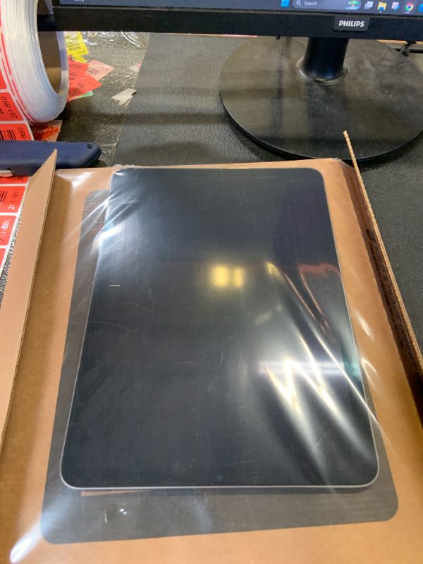 Photo 1 of Apple iPad Air (5th Generation): with M1 chip, 10.9-inch Liquid Retina Display, 256GB, Wi-Fi 6, 12MP front/12MP Back Camera, Touch ID, All-Day Battery Life – Space Gray
