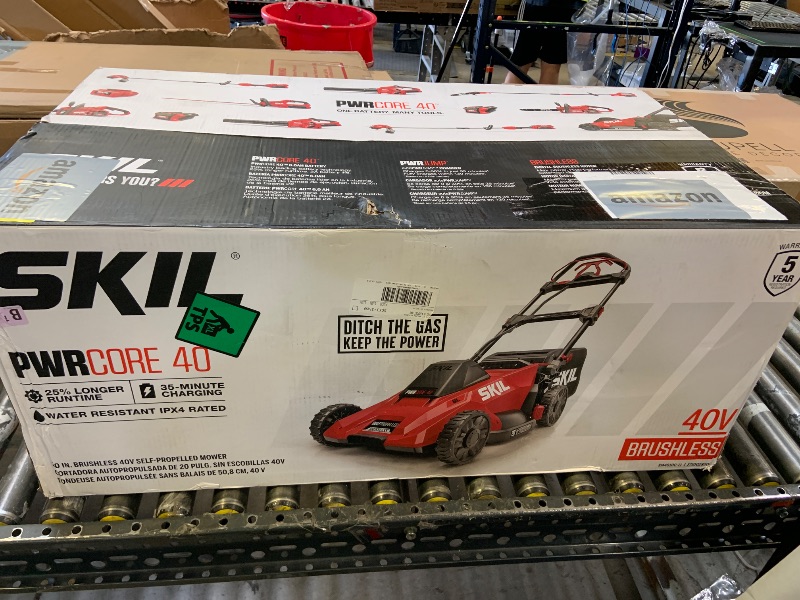 Photo 1 of SKIL PWR CORE 40 Brushless 40V 20-Inch Self-Propelled Mower Kit, Includes 6.0Ah Battery and Auto PWR JUMP Charger - SM4910C-11