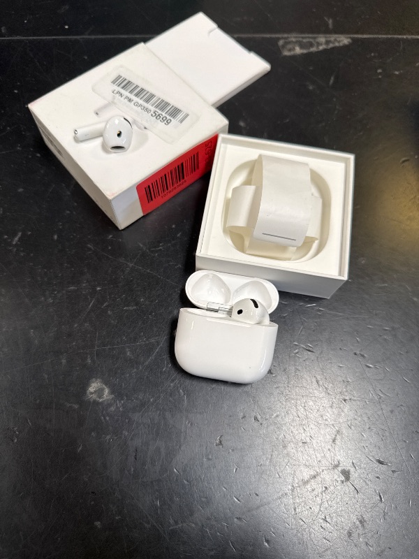Photo 1 of Charging port doesn’t work **Apple AirPods 4 Wireless Earbuds, Bluetooth Headphones, Personalized Spatial Audio, Sweat and Water Resistant, USB-C Charging Case, H2 Chip, Up to 30 Hours of Battery Life, Effortless Setup for iPhone