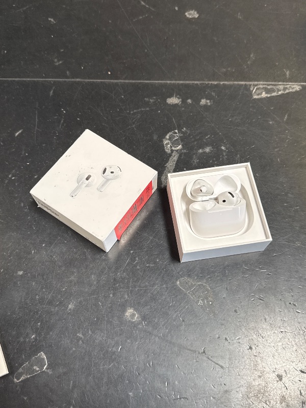 Photo 1 of Apple AirPods 4 Wireless Earbuds, Bluetooth Headphones, with Active Noise Cancellation, Adaptive, Transparency Mode, Personalized Spatial Audio, USB-C Charging Case, Wireless Charging, H2 Chip
