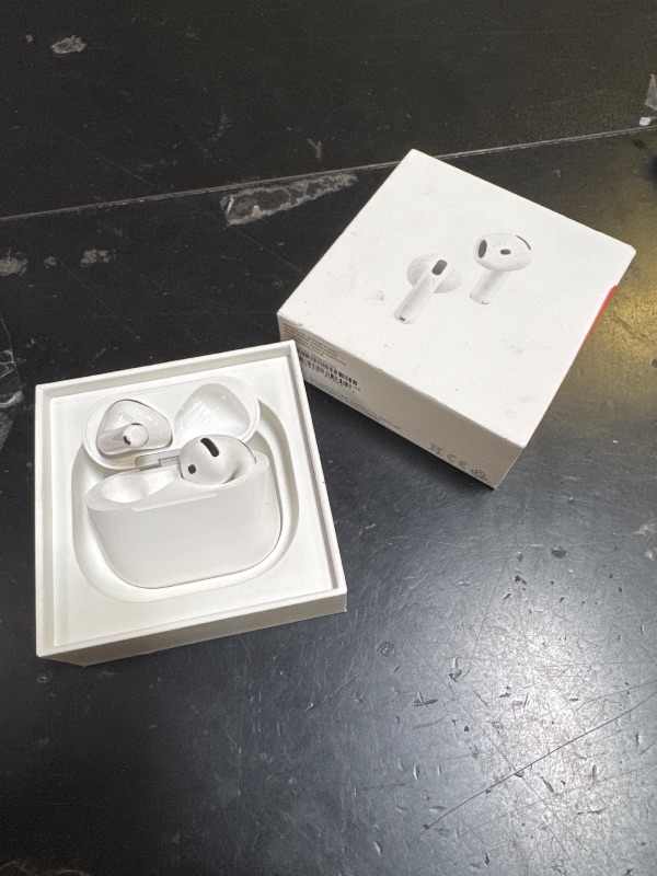 Photo 1 of Apple AirPods 4 Wireless Earbuds, Bluetooth Headphones, with Active Noise Cancellation, Adaptive, Transparency Mode, Personalized Spatial Audio, USB-C Charging Case, Wireless Charging, H2 Chip