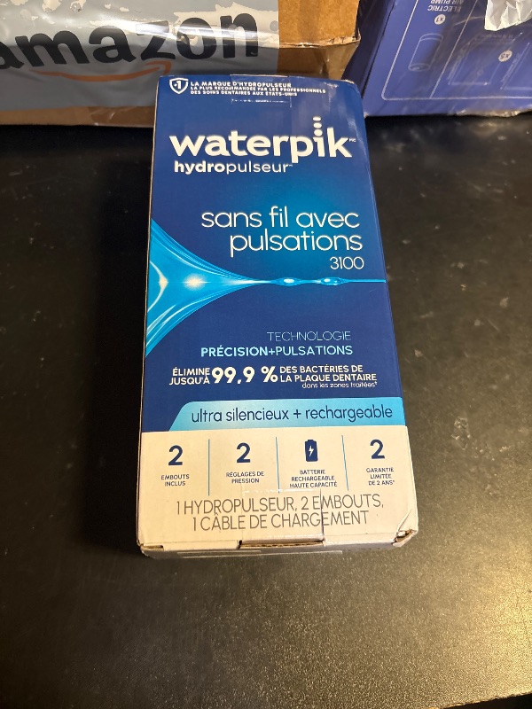 Photo 1 of Waterpik Cordless Pulse 3100 Rechargeable Portable Water Flosser for Teeth, Gums, Braces Care and Travel with 2 Flossing Tips, Waterproof for Shower Use, ADA Accepted, WF-20 Blue, Amazon Exclusive
