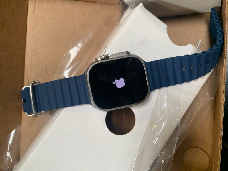 Photo 1 of Apple Watch Ultra 2 [GPS + Cellular, 49mm] - Titanium Case with Blue Ocean Band, One Size (Renewed)