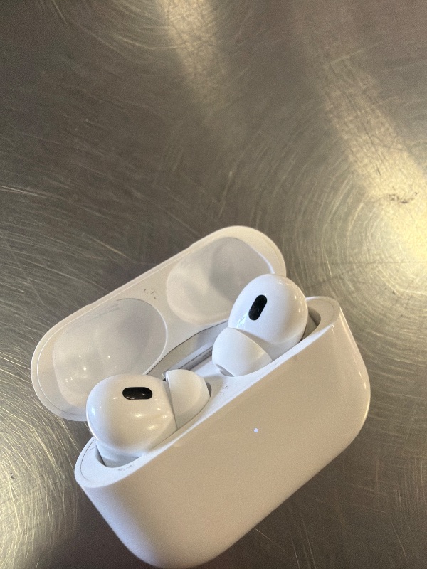 Photo 1 of Apple AirPods Wireless Earbuds, Active Noise Cancellation, Live Translation, Heart Rate Sensing, Hearing Aid Feature, Bluetooth Headphones, Spatial Audio, High-Fidelity Sound, USB-C Charging