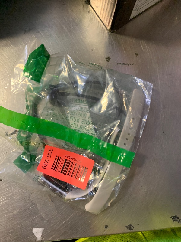 Photo 1 of SELLING FOR PARTS ONLY ................................Fitbit Charge 6 Fitness Tracker with Google Apps - Heart Rate on Exercise Equipment - 3-Month Google Health Premium Membership Included - Health Tools - Porcelain/Silver - Small&Large Bands Included