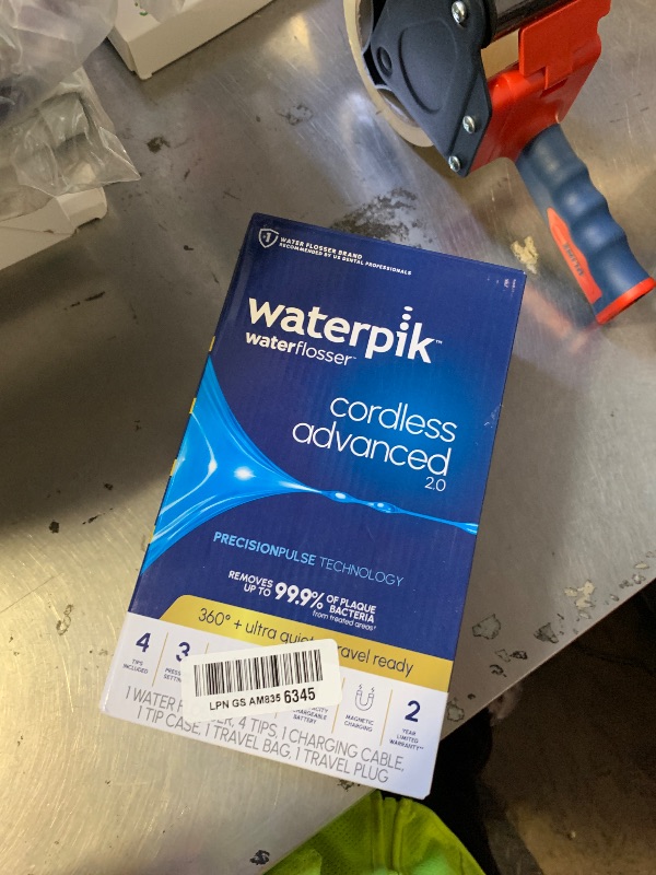 Photo 1 of Waterpik Cordless Advanced 2.0 Water Flosser For Teeth, Gums, Braces, Dental Care With Travel Bag and 4 Tips, ADA Accepted, Rechargeable, Portable, and Waterproof, White WP-580, Packaging May Vary