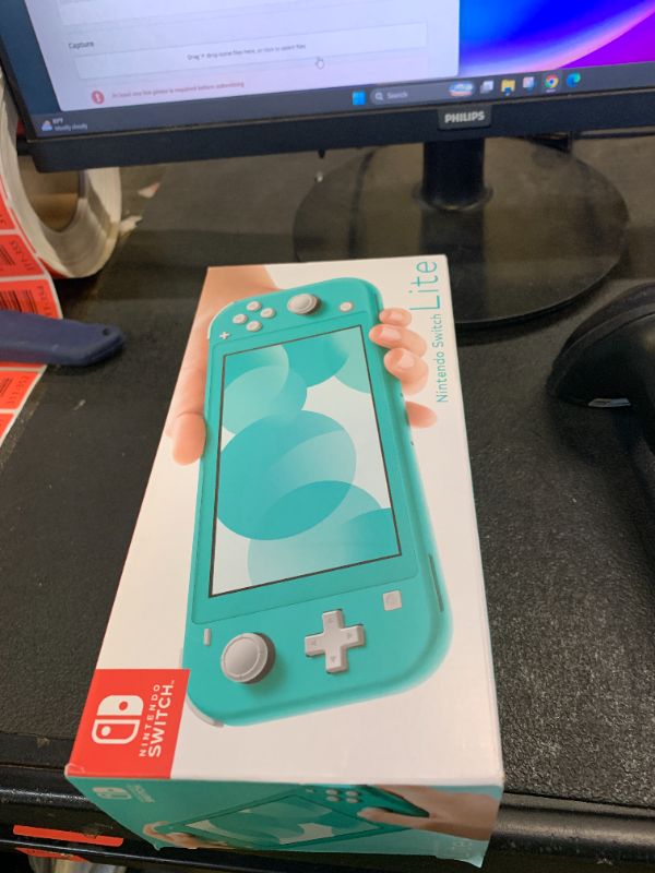 Photo 1 of Nintendo Switch Lite - Turquoise