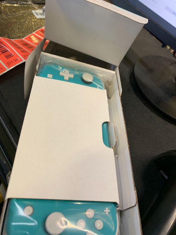 Photo 1 of Nintendo Switch Lite - Turquoise