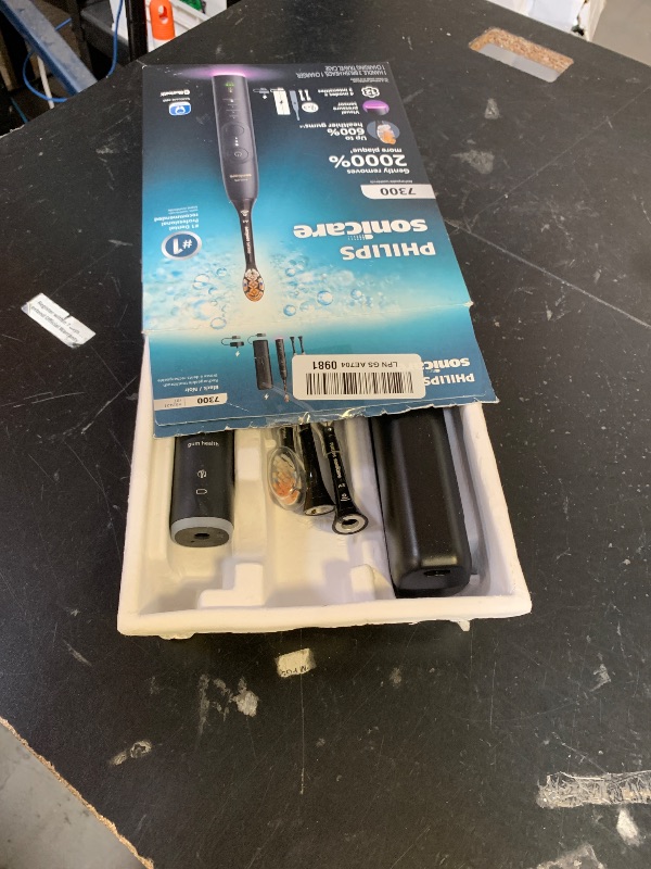 Photo 1 of Philips Sonicare 7300 Series Electric Toothbrush - Next-Generation Sonicare Technology, Pressure Sensor, 12 Brushing Settings, SmarTimer, BrushPacer, 21-Day Runtime, Travel Case, Black, HX7421/07