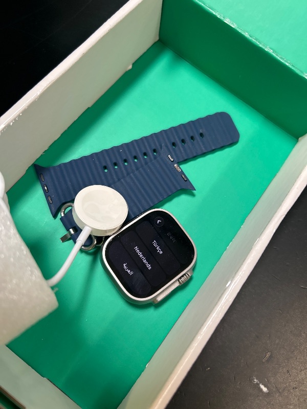 Photo 1 of Apple Watch Ultra 2 [GPS + Cellular, 49mm] - Titanium Case with Blue Ocean Band, One Size (Renewed Premium)