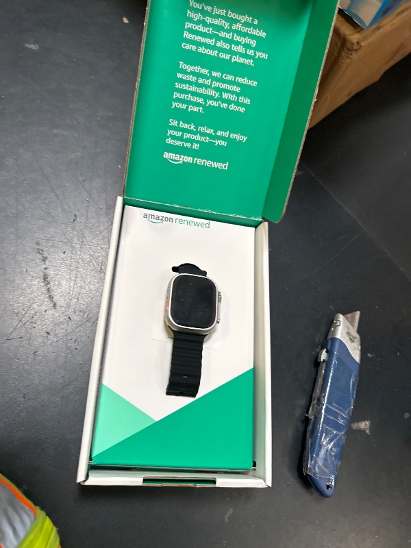 Photo 1 of Apple Watch Ultra [GPS + Cellular 49mm] Titanium Case with Midnight Ocean Band, One Size (Renewed Premium)