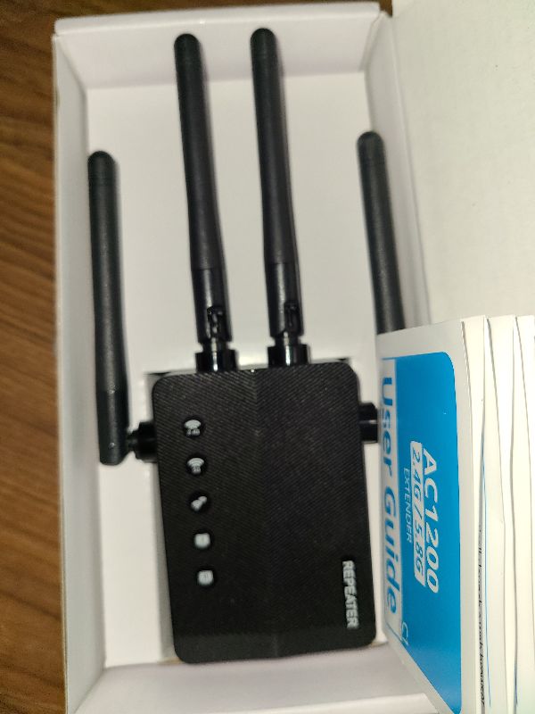 Photo 1 of 1200Mbps WiFi Extender Signal Booster, 12880 Sq.Ft Reach with 105 - Device Support, Dual Band 5GHz/2.4GHz, Easy Setup for Home, Long Range WiFi Extender