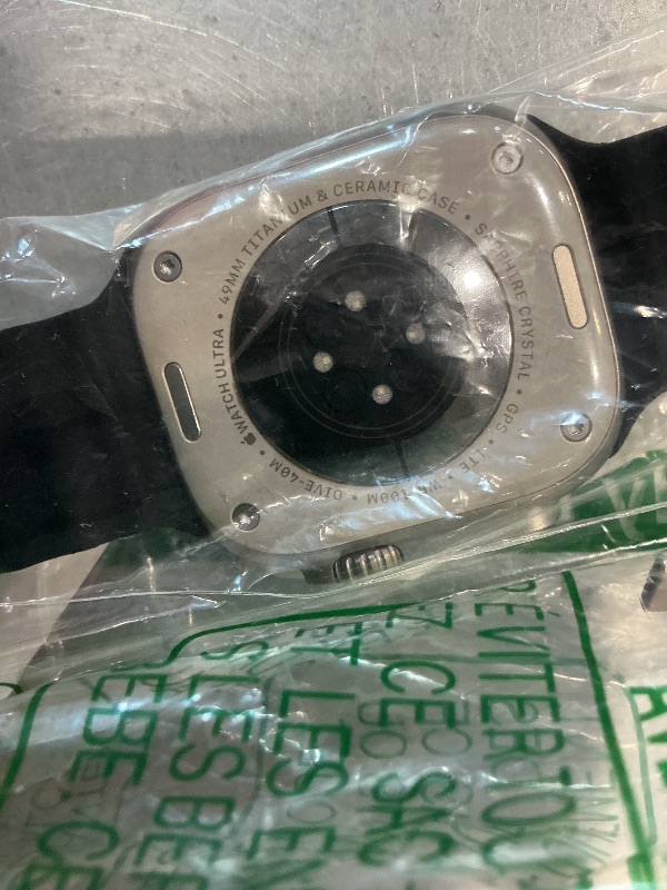 Photo 1 of *** Only works in parts, it doesn't turn on ****** ** 
Apple Watch Ultra [GPS + Cellular 49mm] Titanium Case with Midnight Ocean Band, One Size (Renewed)