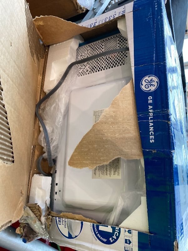 Photo 1 of [DAMAGED] GE Compact Countertop Microwave Oven, 1.1 Cubic Ft., 950w Capacity, 6 Auto Cook Settings, Child-Lock Technology, Dorm Room, Apartment, Stainless Steel