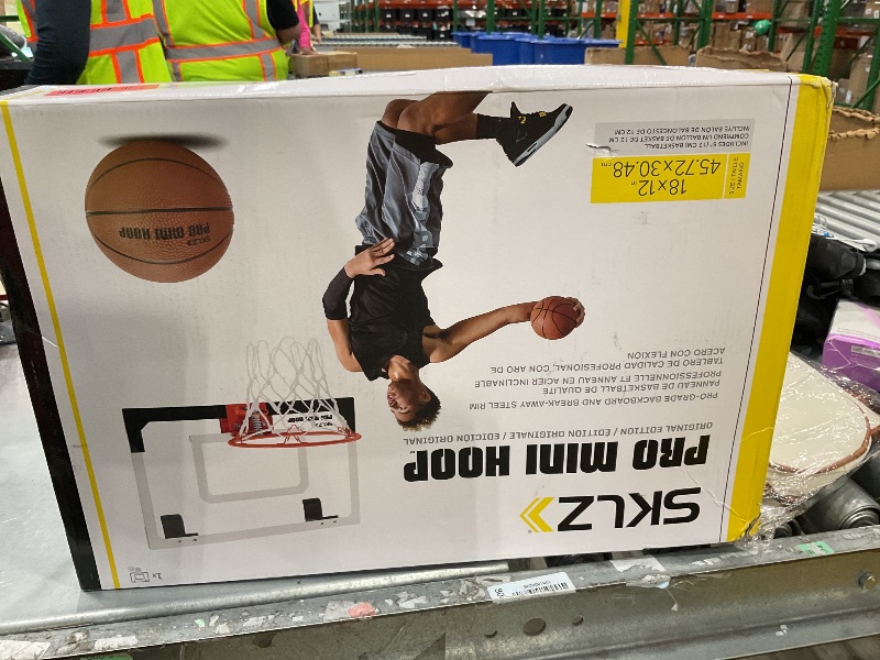 Photo 1 of [DAMAGED] SKLZ Pro Mini Basketball Hoop - 18" x 12" Clear, Shatterproof Backboard, Breakaway Rim, Heavy Duty Net, & 5" Ball - Easy Mount Padded, Slide-On Over-Door Mounts - Suitable for Office, Dorm, Bedroom