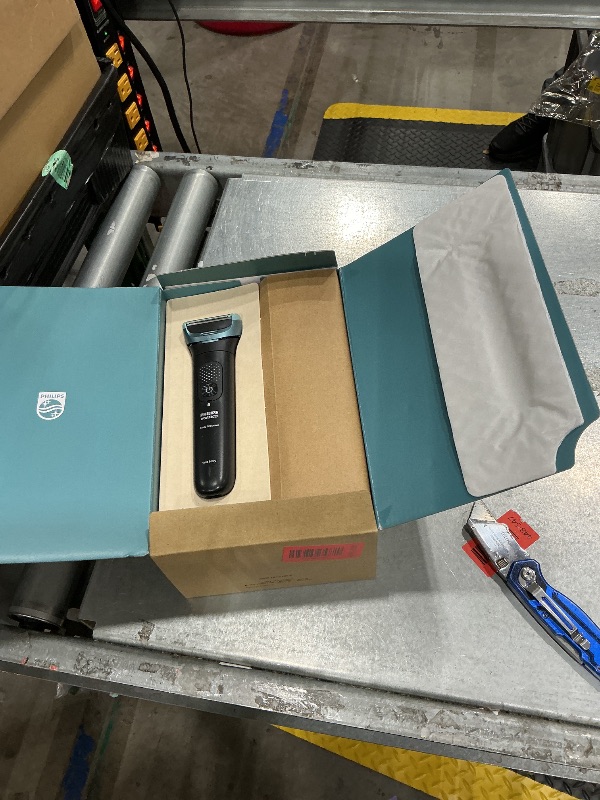 Photo 1 of ** MISSING SOME ACCESSORIES ** Philips Norelco Body Groomer 9000 Series, Intimate Trimmer for Bi-directional Use & Waterproof Wet Dry Body Shaver System with Foldable Back Attachment & UV Cube Cleaner, BG9485/50