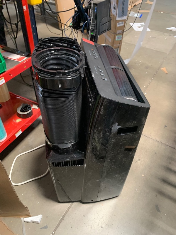 Photo 1 of **FOR PARTS, NONFUNCTIONAL**midea 14000 btu portable air conditioner