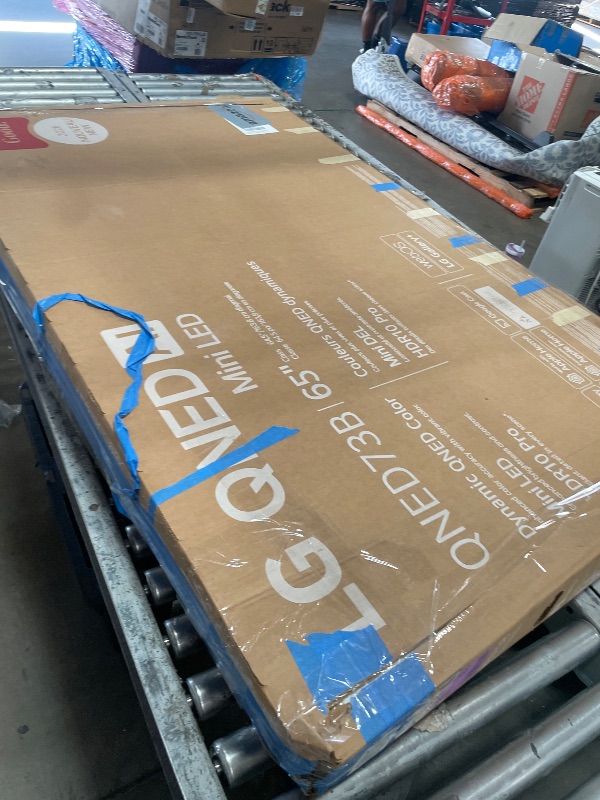 Photo 1 of **DAMAGED DOES NOT POWER ON** LG Amazon Exclusive 65-Inch Class QNED AI 4K QNED73B Series Mini LED Smart TV w/Sound Pro, HDR10, Super Upscaling, Filmmaker Mode, Wow Orchestra, Compatible with Alexa, 65QNED73BUA, 2026