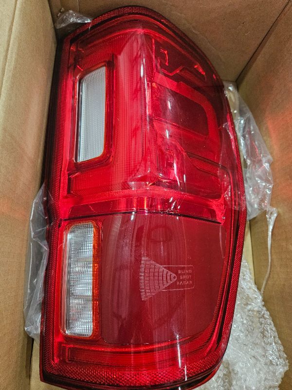 Photo 1 of (passenger-side) LED tail light assembly with a blind spot radar indicator, designed for a 2019–2023 Ford Ranger