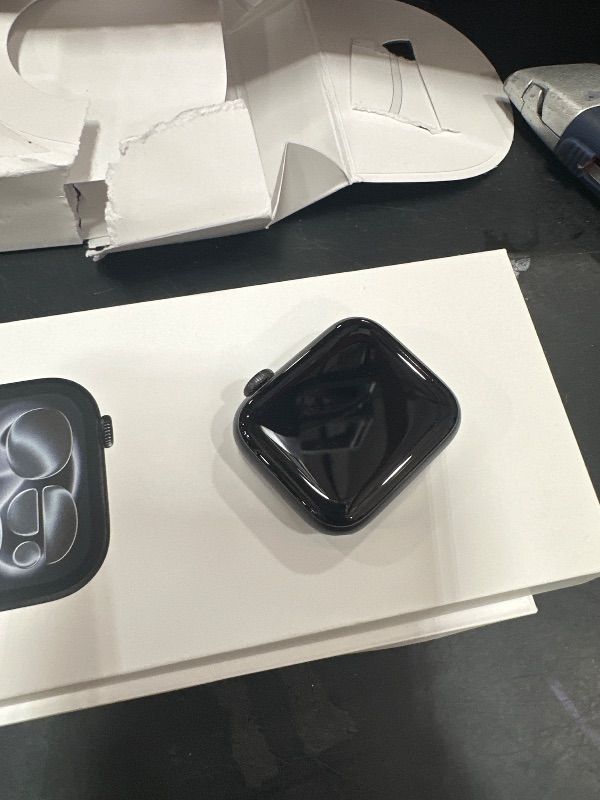Photo 1 of **LOCKED TO PREVIOUS OWNER, NOT IN ORIGINAL PACKAGING** Apple Watch Series 6 (GPS, 40mm) - Space Gray Aluminum Case with Black Sport Band (Renewed)