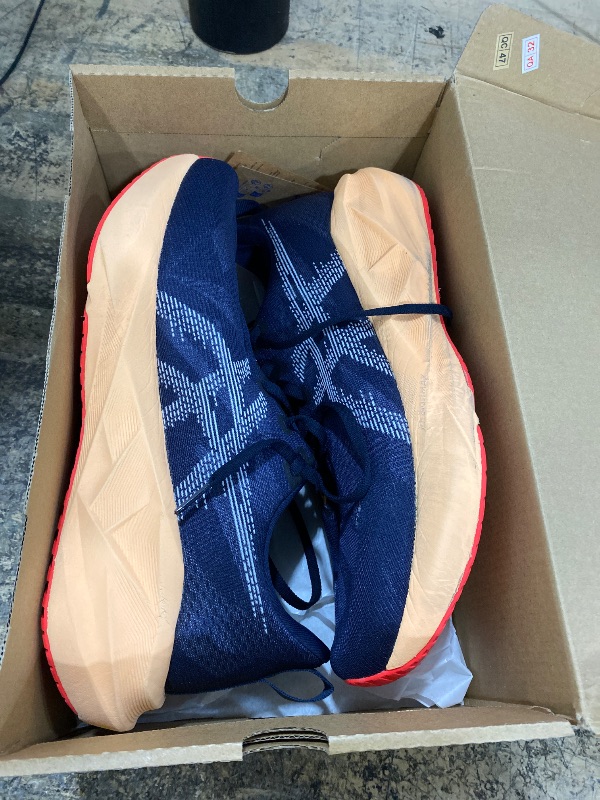 Photo 1 of ******MINOR TINY RIP ON TIP OF SHOE ******** ASICS Men's NOVABLAST 5 Running Shoes, 11, Midnight/Orange Glow