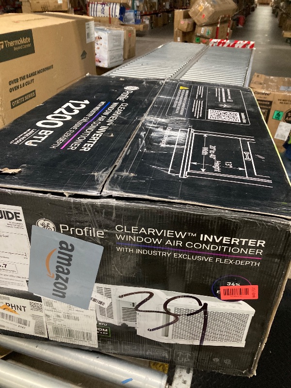 Photo 1 of **** PARTS ONLY **** GE Profile ClearView Inverter Window Air Conditioner Unit, 12,200 BTU, Energy Efficient Cooling up to 550 sq ft., Ultra Quiet, SMART Home Capable, Includes Remote, White