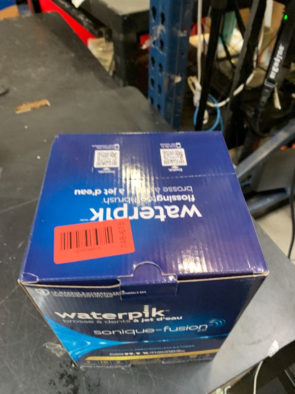 Photo 1 of Waterpik Sonic-Fusion Flossing Electric Toothbrush Water Flosser, White